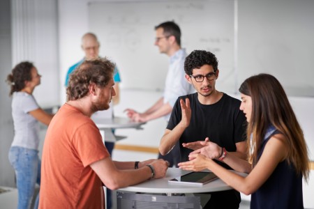 Group of scientists discussing