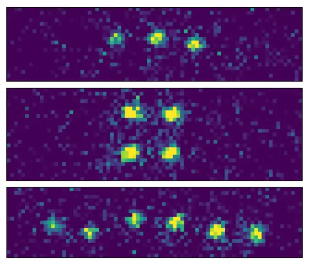 Grafik von Rubidium-Atome als Quantenbits in dem optischen Resonator.